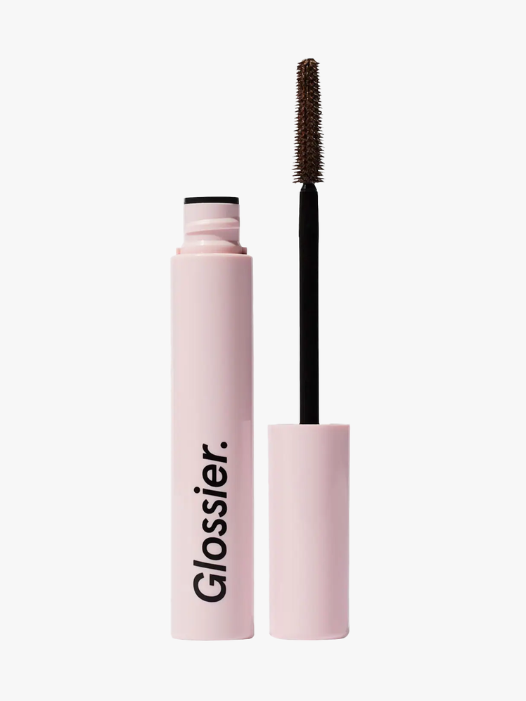 Glossier Lash Slick in branded twist up component on a light gray background