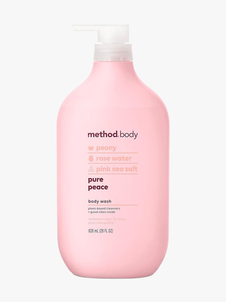 Method Body Wash in pink bottle on gray background