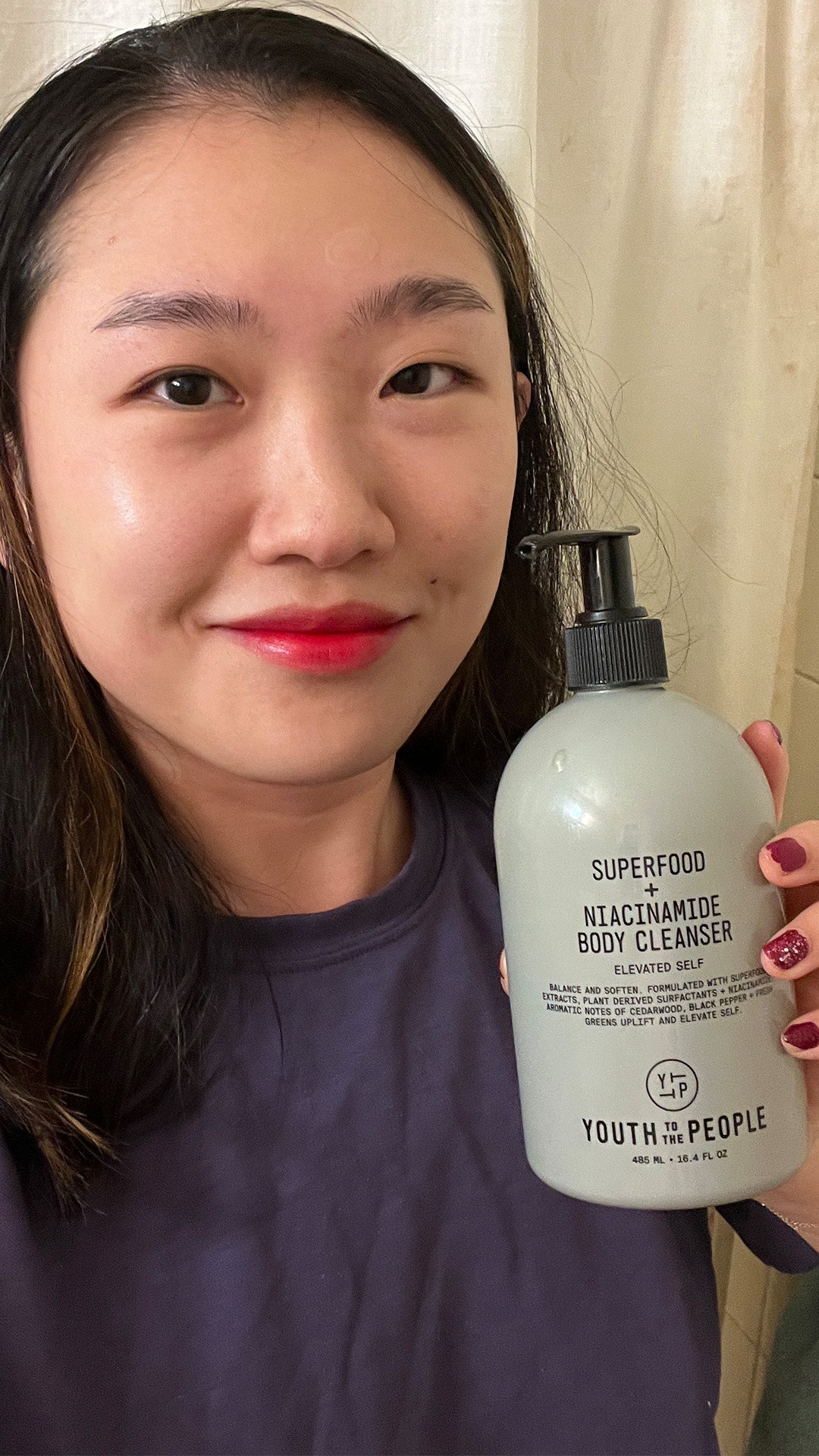 Commerce editor Sarah Han with the Youth to the People Superfood  Niacinamide Body Cleanser