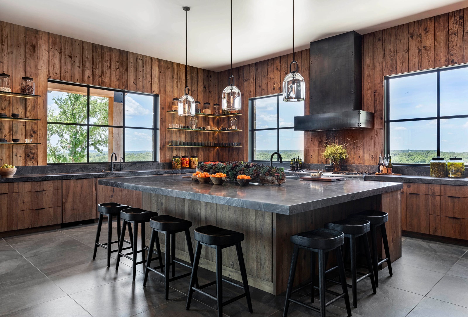 Image may contain Indoors Interior Design Kitchen Kitchen Island Hardwood Stained Wood Wood and Wood Panels