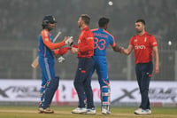 | Photo: AP/Bikas Das : IND vs ENG 1st T20: Jos Buttler congratulates India's Tilak Varma after India won