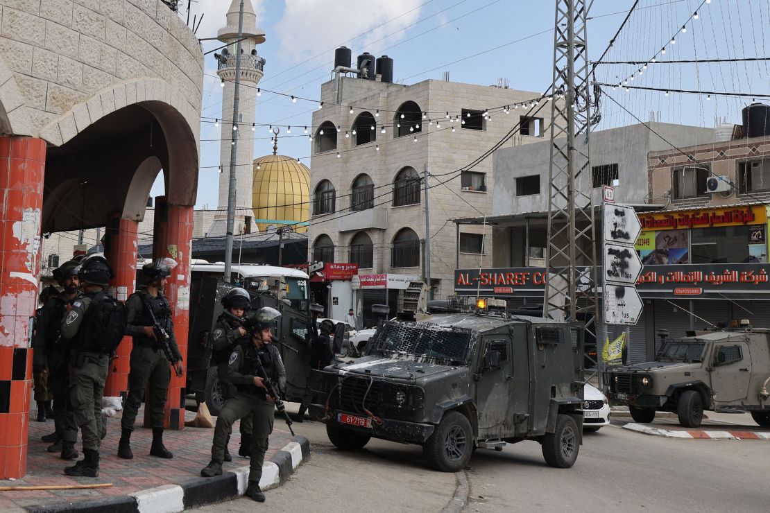 Israeli security forces patrol Huwara on March 26.