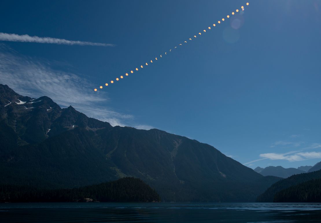 This composite image shows the progression of a partial solar eclipse over Ross Lake, in Northern Cascades National Park, Washington on Monday, Aug. 21, 2017. A total solar eclipse swept across a narrow portion of the contiguous United States from Lincoln Beach, Oregon to Charleston, South Carolina. A partial solar eclipse was visible across the entire North American continent along with parts of South America, Africa, and Europe.