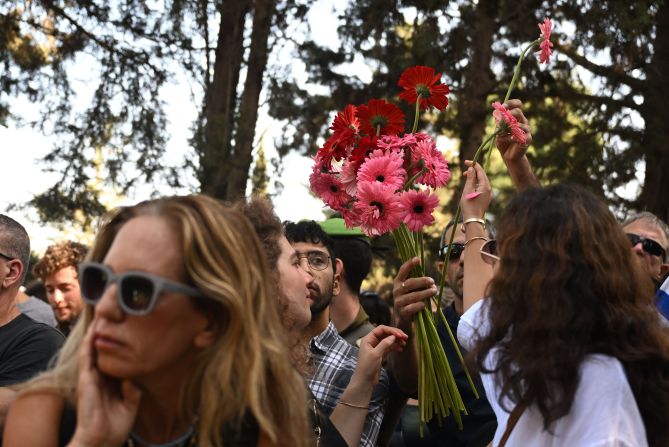 Family and friends grieve for Capt. (Res.) Yuval Zilber at the Netaim Cemetery in Netaim, Israel, on November 3.