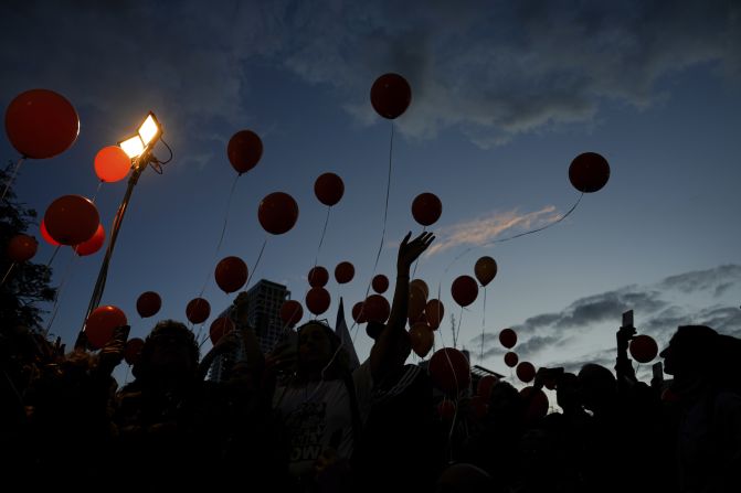 Protesters release balloons as they call for the release of the Bibas family, whose members are being held hostage in Gaza by Hamas, in Tel Aviv, Israel, on November 28.