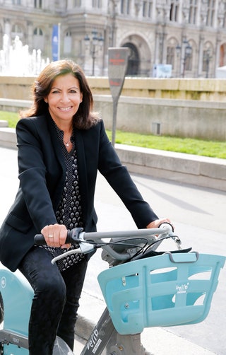 Image may contain Anne Hidalgo Clothing Apparel Human Person Transportation Vehicle Coat Suit Overcoat and Female