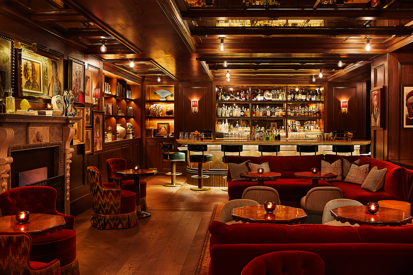 Designed by Martin Brudnizki the intimate and moodilylit Portrait Bar at The Fifth Avenue Hotel in Manhattan is a...