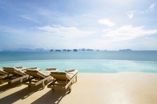 Looking out over Thailand's James Bondworthy Phang Nga Bay the Six Senses Yao Noi pool has incredible views of the...