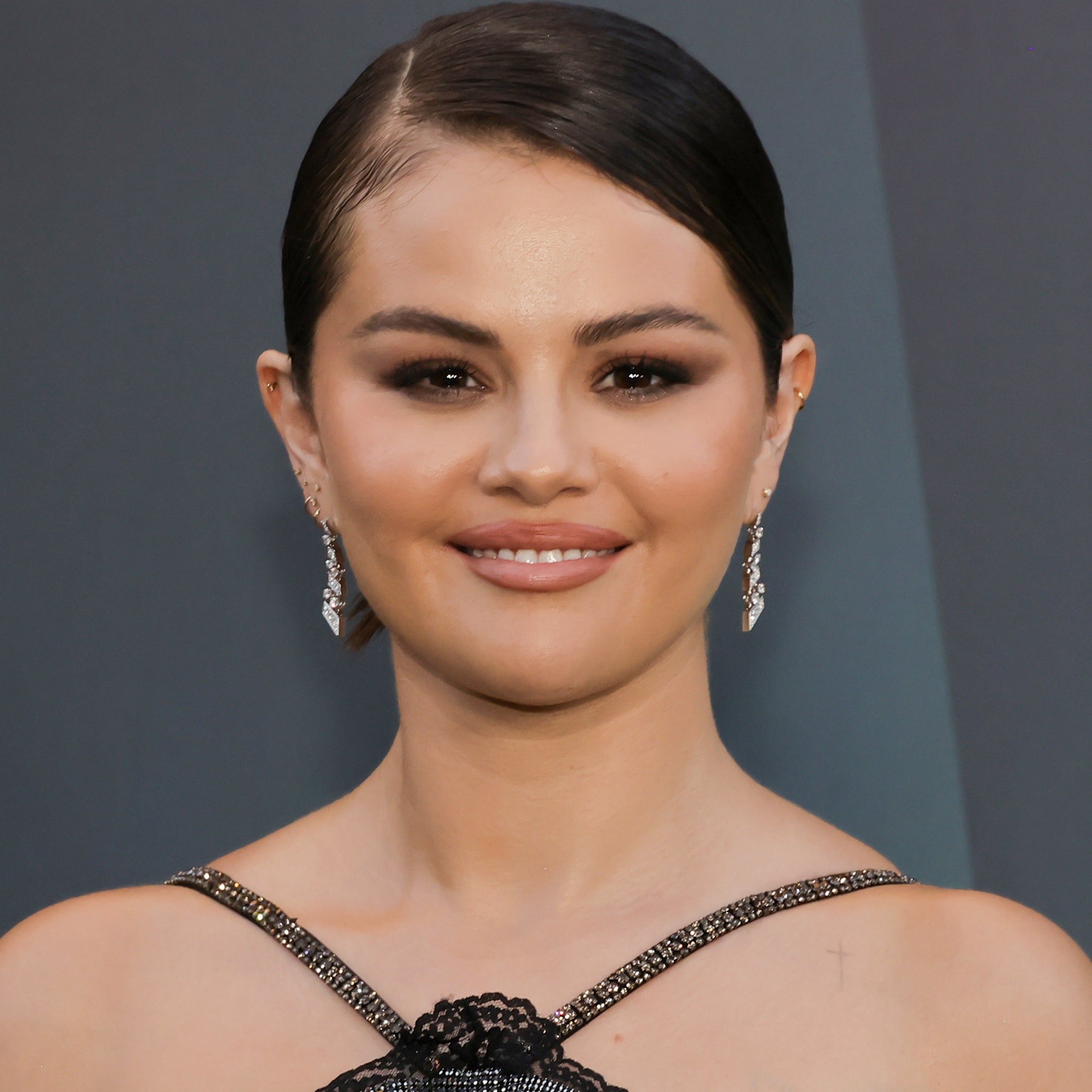 Selena Gomez’s Wavy Bob Is as Sweet as Her Little White Dress