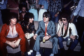 Image may contain Bill Wyman Human Person Sunglasses Accessories Accessory Clothing Apparel and Mick Jagger