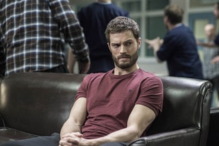 Image may contain Jamie Dornan Human Person Couch Furniture and Sitting