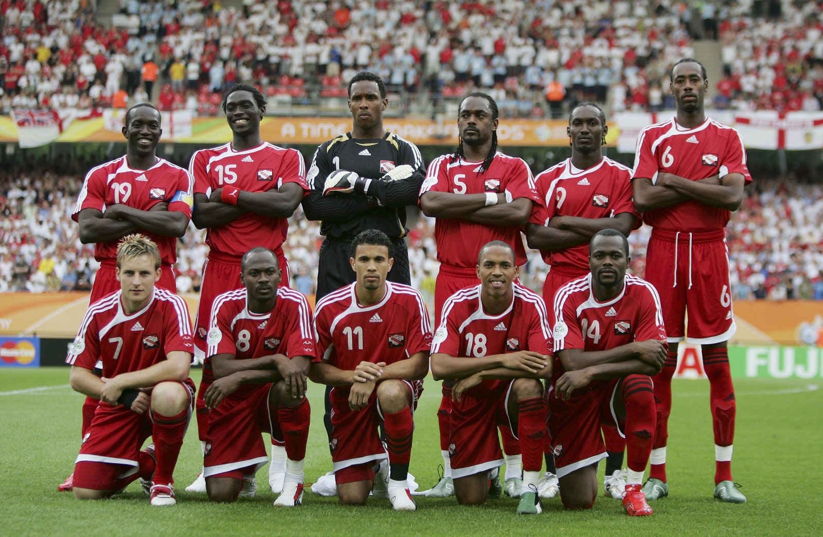 Image may contain Shaka Hislop Stern John Chris Birchall Kenwyne Jones Human Person People Helmet and Clothing