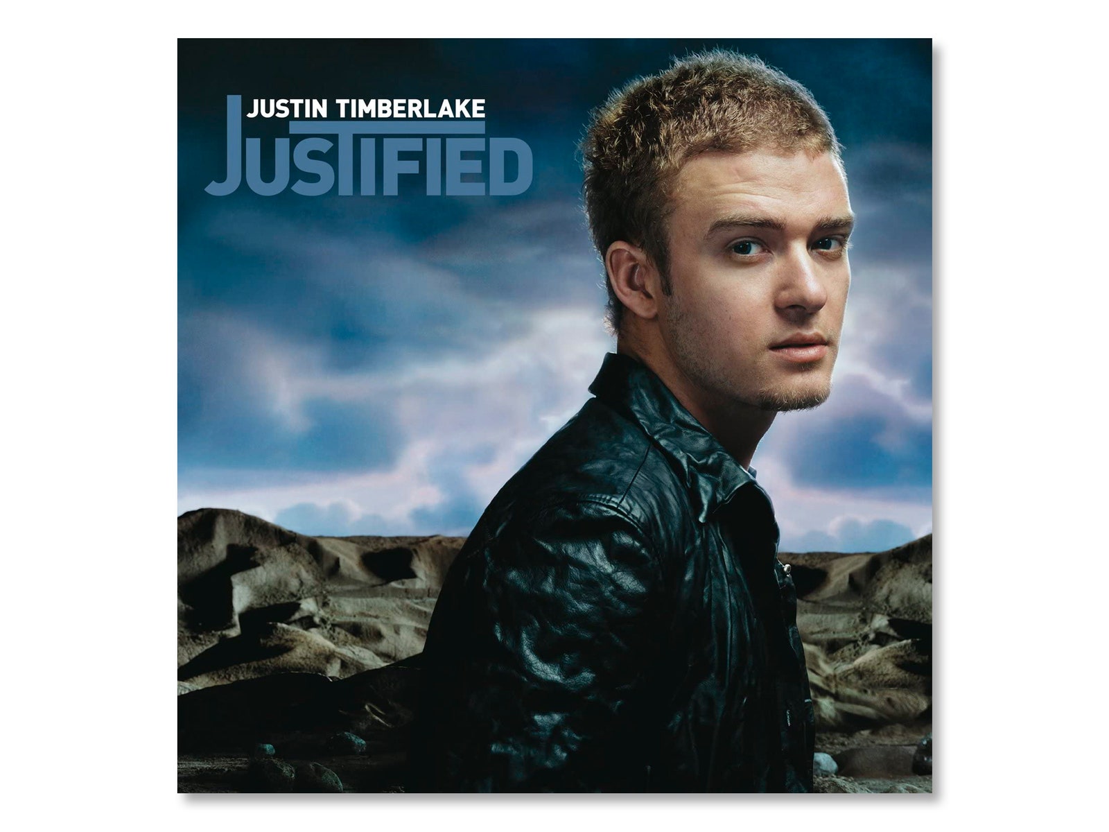 Image may contain Clothing Apparel Jacket Coat Justin Timberlake Human Person Advertisement Poster and Head