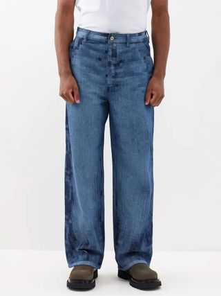 Blending the virtual world with the physical one these wideleg jeans from Loewe look like something straight outta...