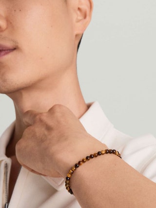 Image may contain Accessories Bracelet Jewelry Body Part Face Head Neck and Person
