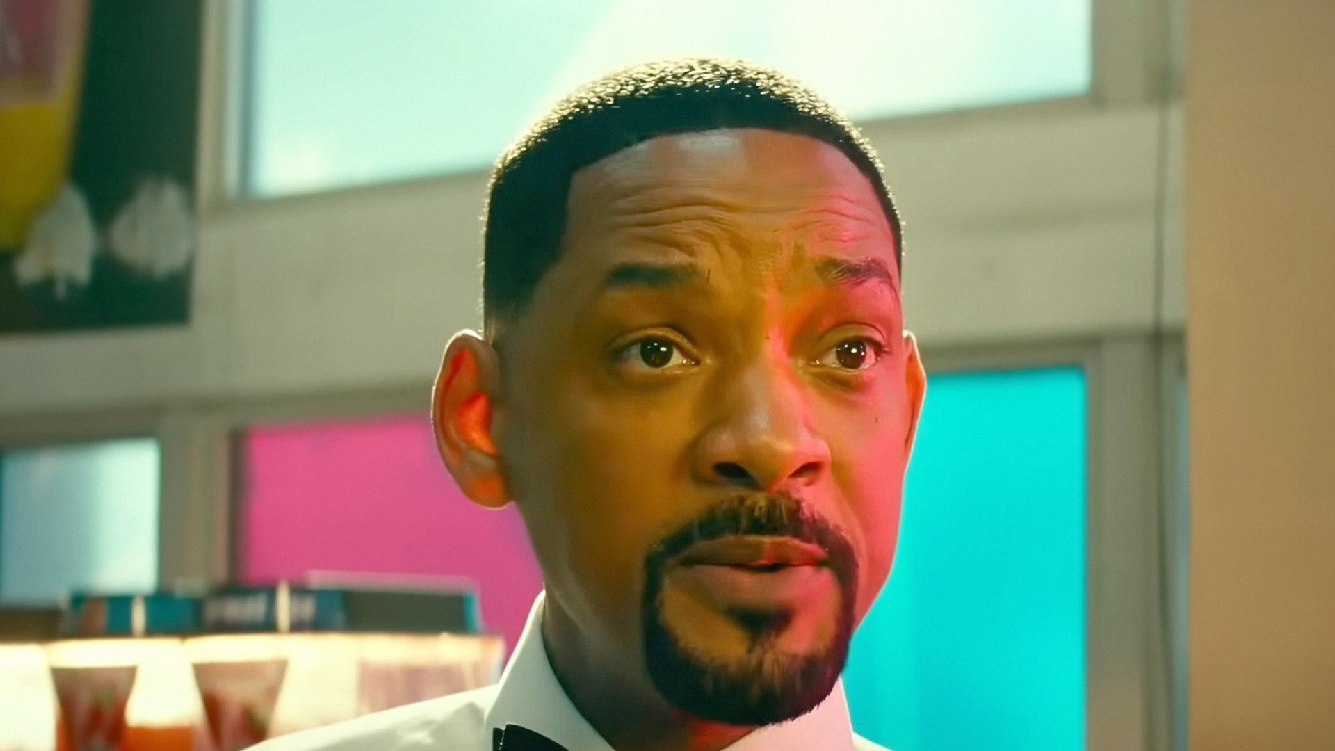 Image may contain Will Smith Head Person Face Adult Accessories Formal Wear Tie Cup Photography and Portrait