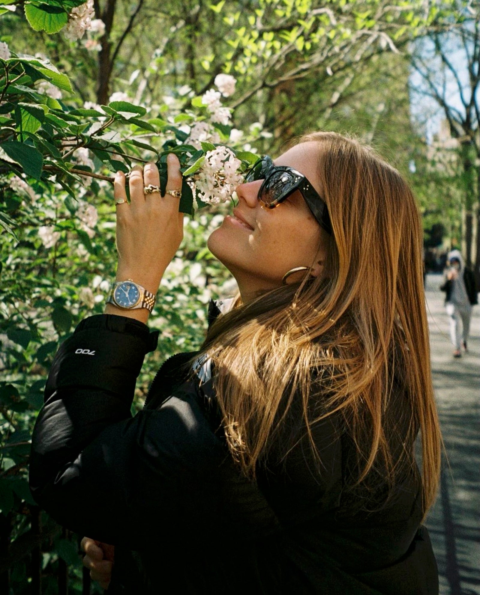 Image may contain Head Person Face Adult Photography Portrait Brown Hair Hair Plant Vegetation and Accessories