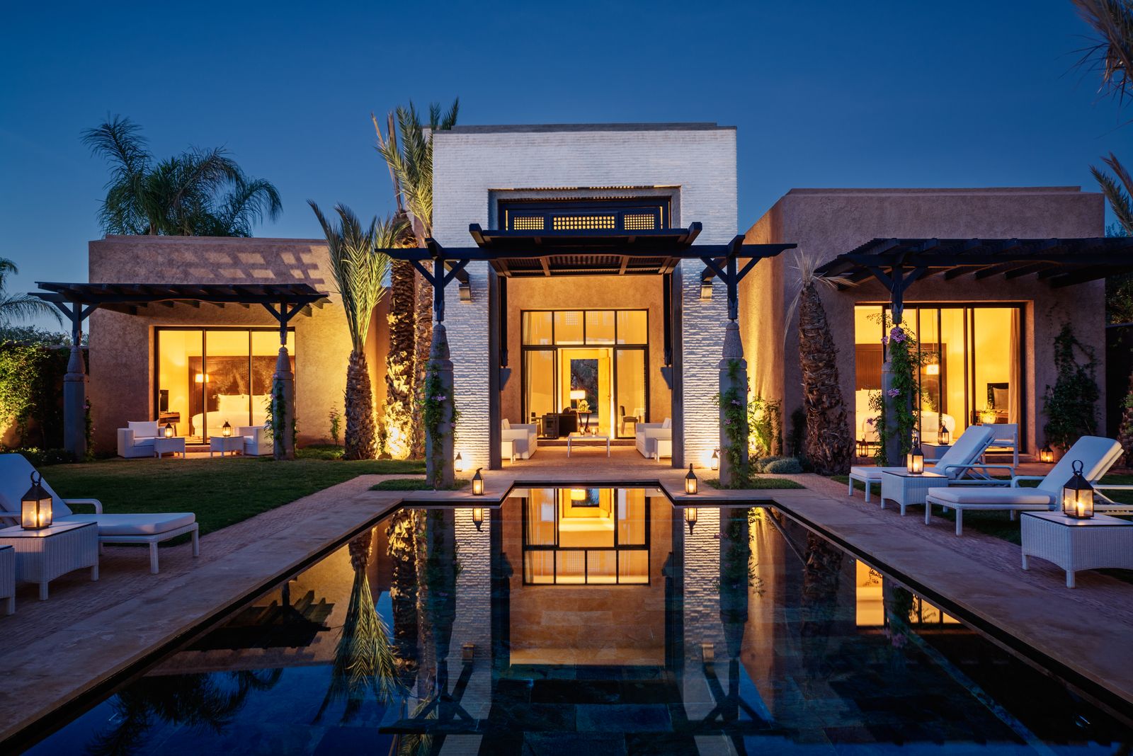 Fairmont Royal Palm Marrakech hotel. Architecture Building House Housing Villa Pool Water Chair Furniture Lamp and...