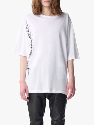 Image may contain Clothing TShirt Sleeve Long Sleeve Blouse and Person