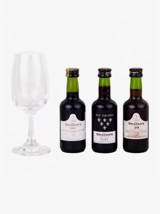 Image may contain Alcohol Beverage Bottle Liquor Wine Wine Bottle Glass Beer and Red Wine