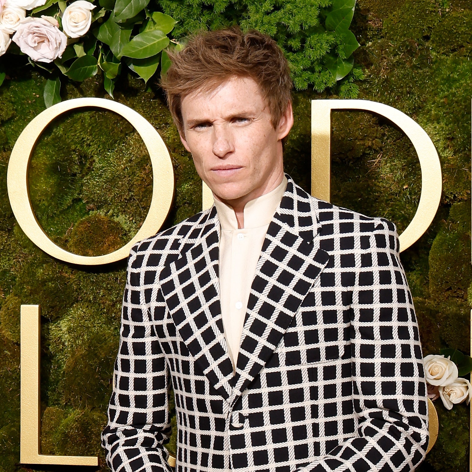 Eddie Redmayne is going so in on the Golden Globes red carpet