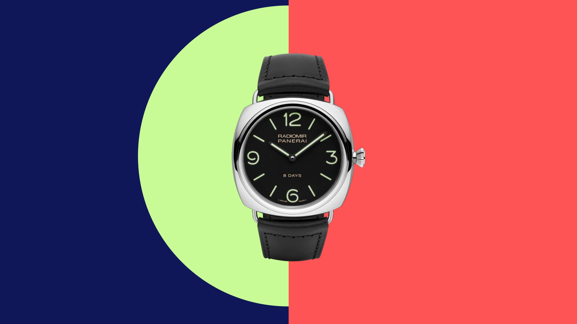 A watch with a black leather band on a blue green and pink colorblocked background