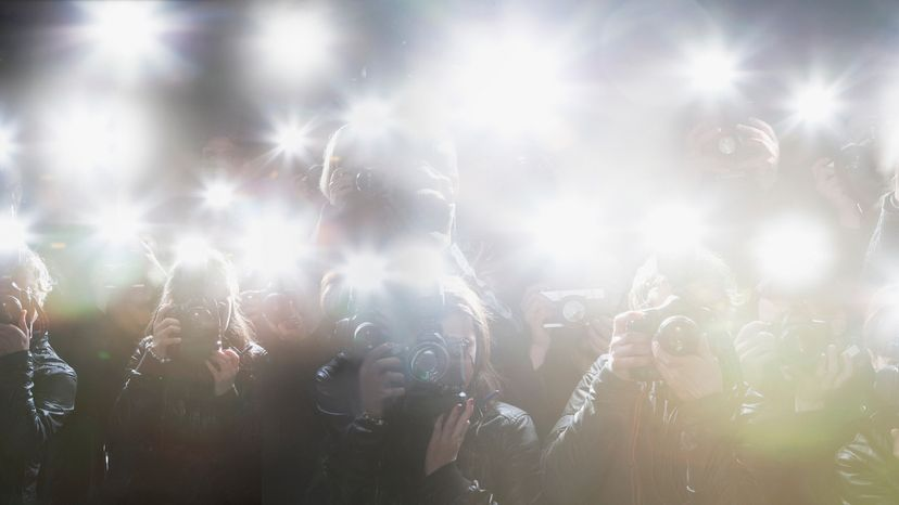 Multiple camera flashes by paparazzi cameras