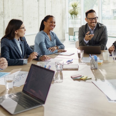 Office workers working together in a conference room