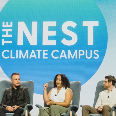 Climate leaders on stage for a panel discussion during Climate Week NYC. 