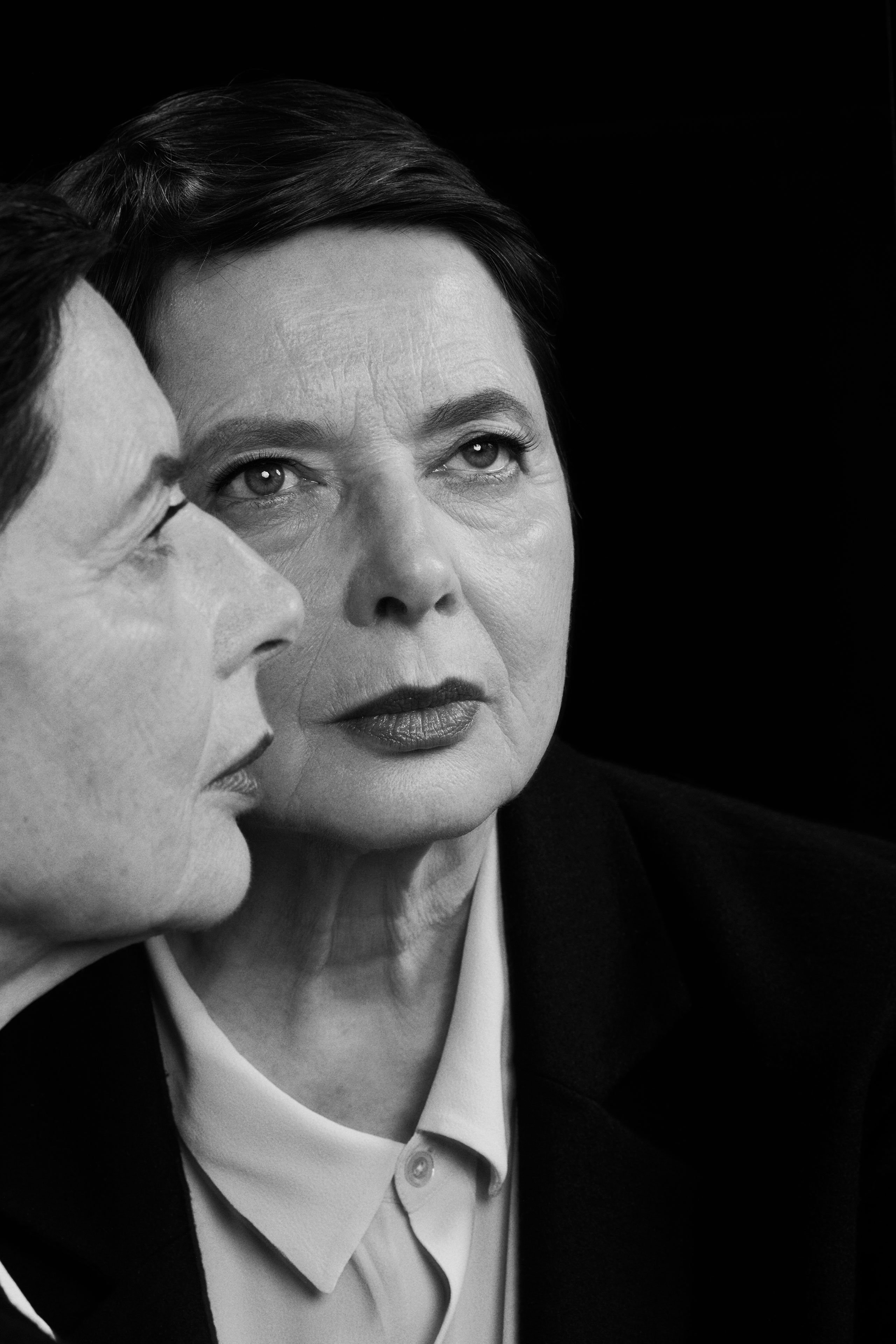 A blackandwhite portrait of Isabella Rossellini with an image of her in profile on top.