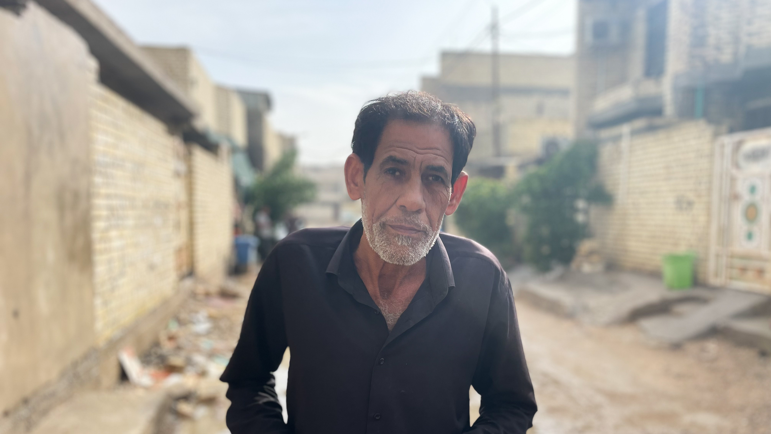 Talib al-Majli, 57, lives in a poor area in Baghdad. He says his detention in Abu Ghraib prison left him destitute and too physically weak and psychologically traumatized to find a reliable job. Now he works odd jobs, sometimes putting up signs for companies, earning around $30 per week.