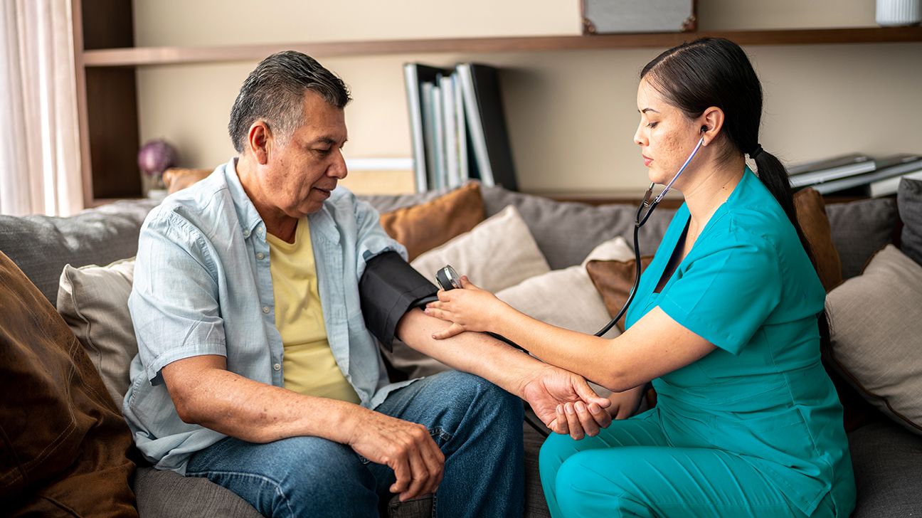 man with secondary hypertensions having his blood pressure checked