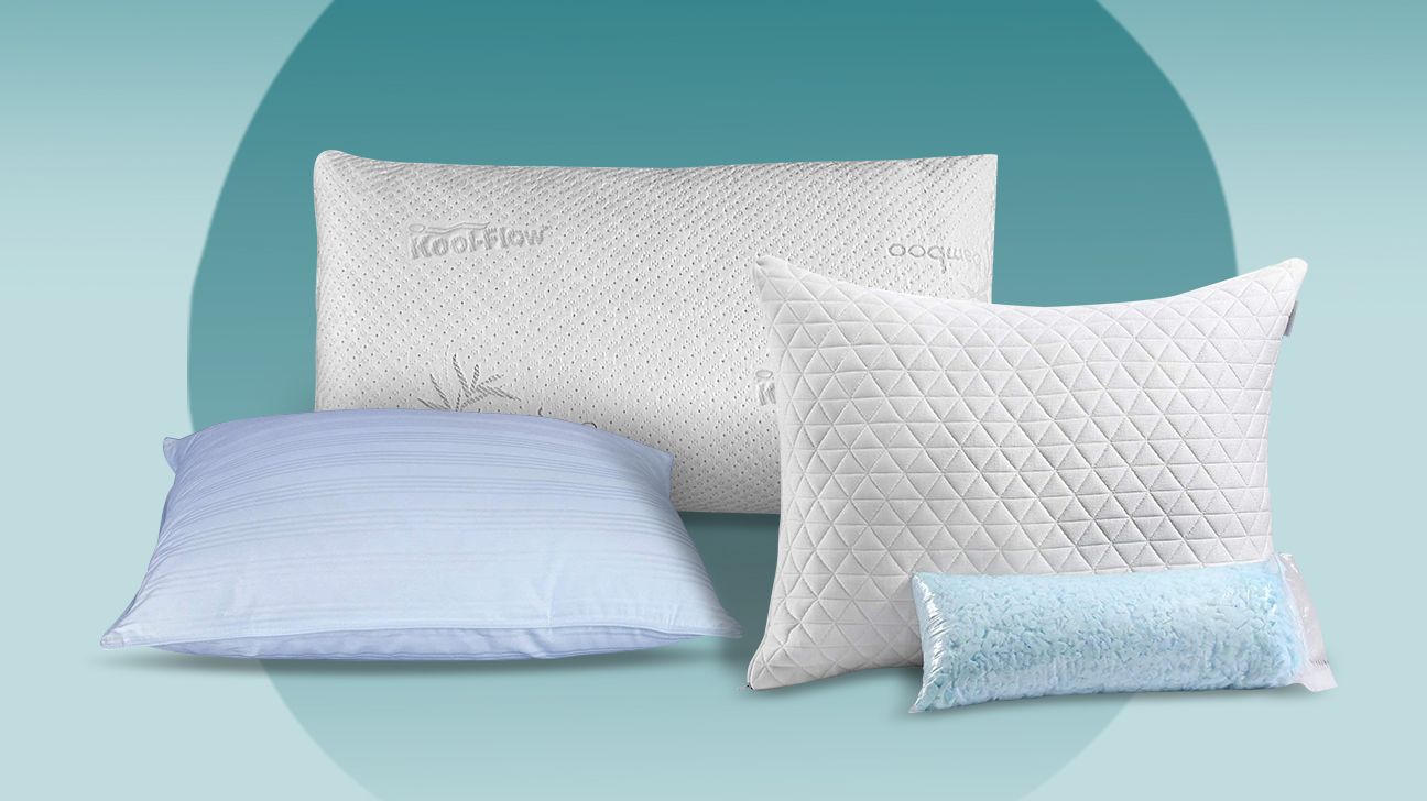 four pillows from our roundup in the center of the header image. a light cyan color for the background