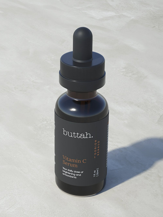 Black bottle of Buttah Skin Vitamin C Serum