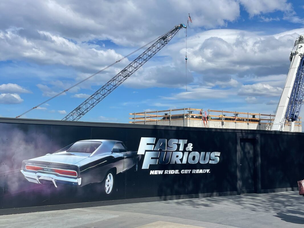 Construction wall sign outside of Fast & Furious roller coaster construction