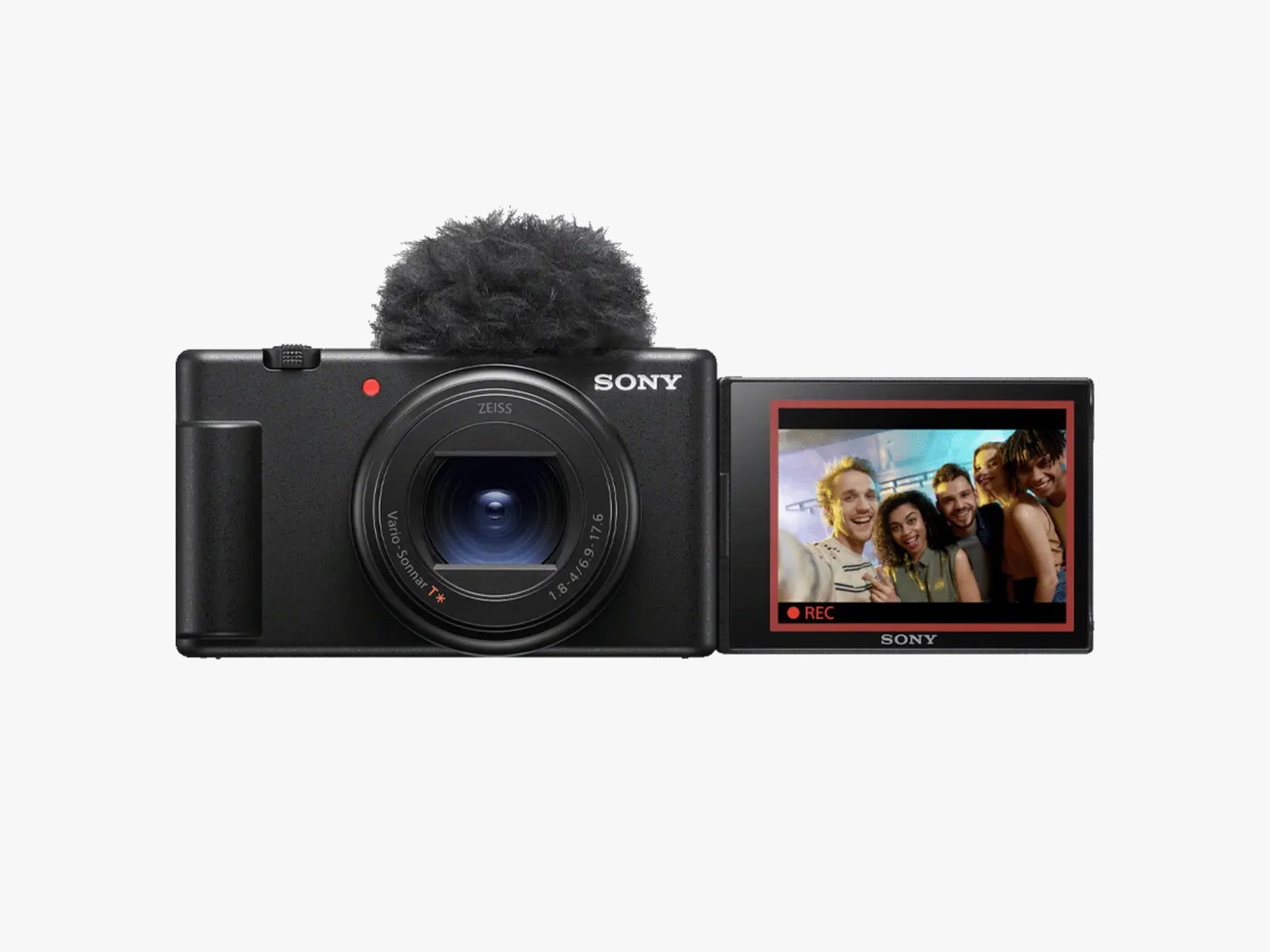 Sleek black camera with small screen extending from the side and a puffy black ball on top for audio support