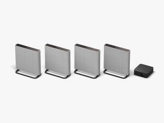 Front view of Sony Bravia Theater Quad 4 silver thin rectangular shaped devices and a small black boxshaped device