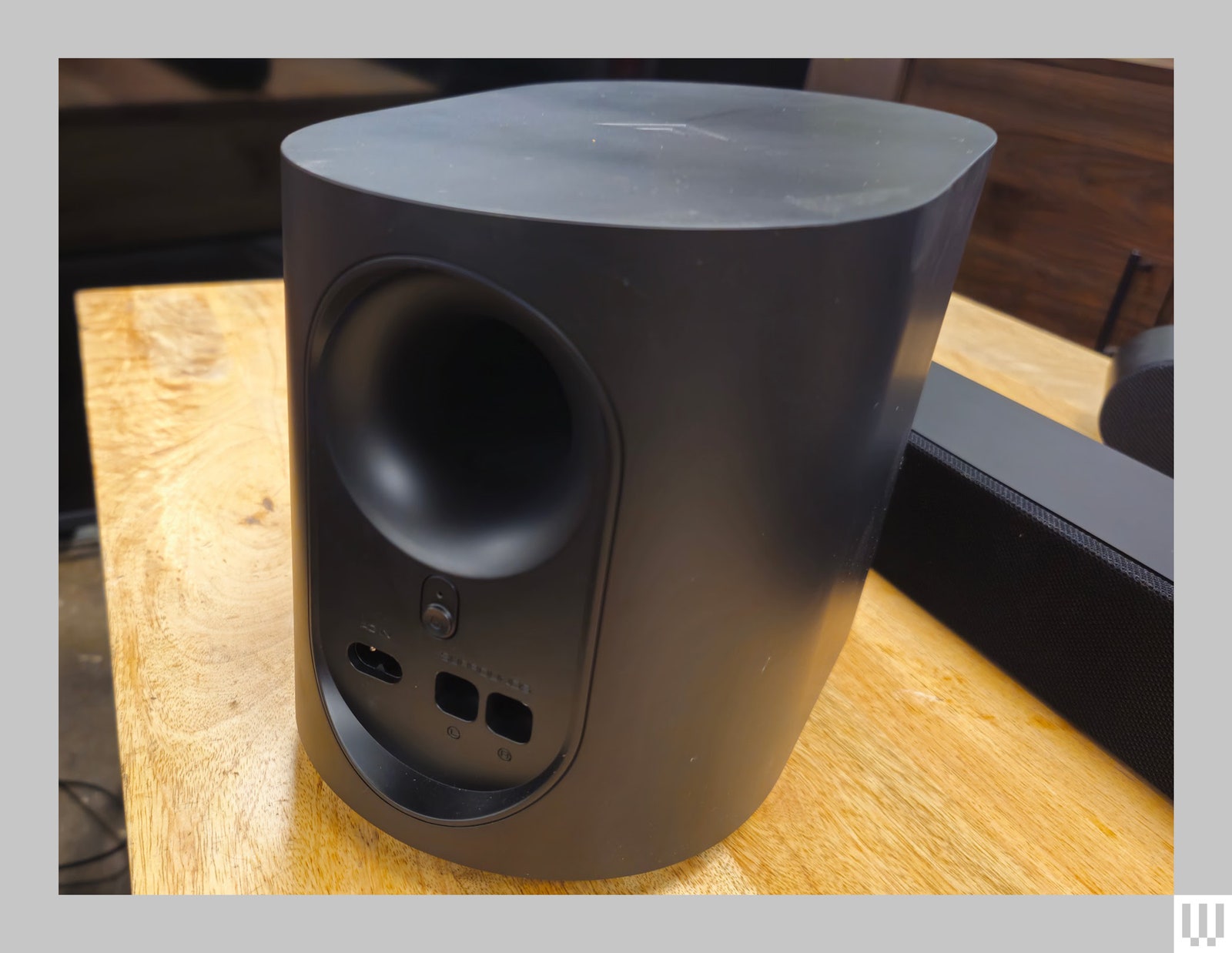 Front view of the subwoofer of the Vizio 5.1 Soundbar system an oval shaped speaker