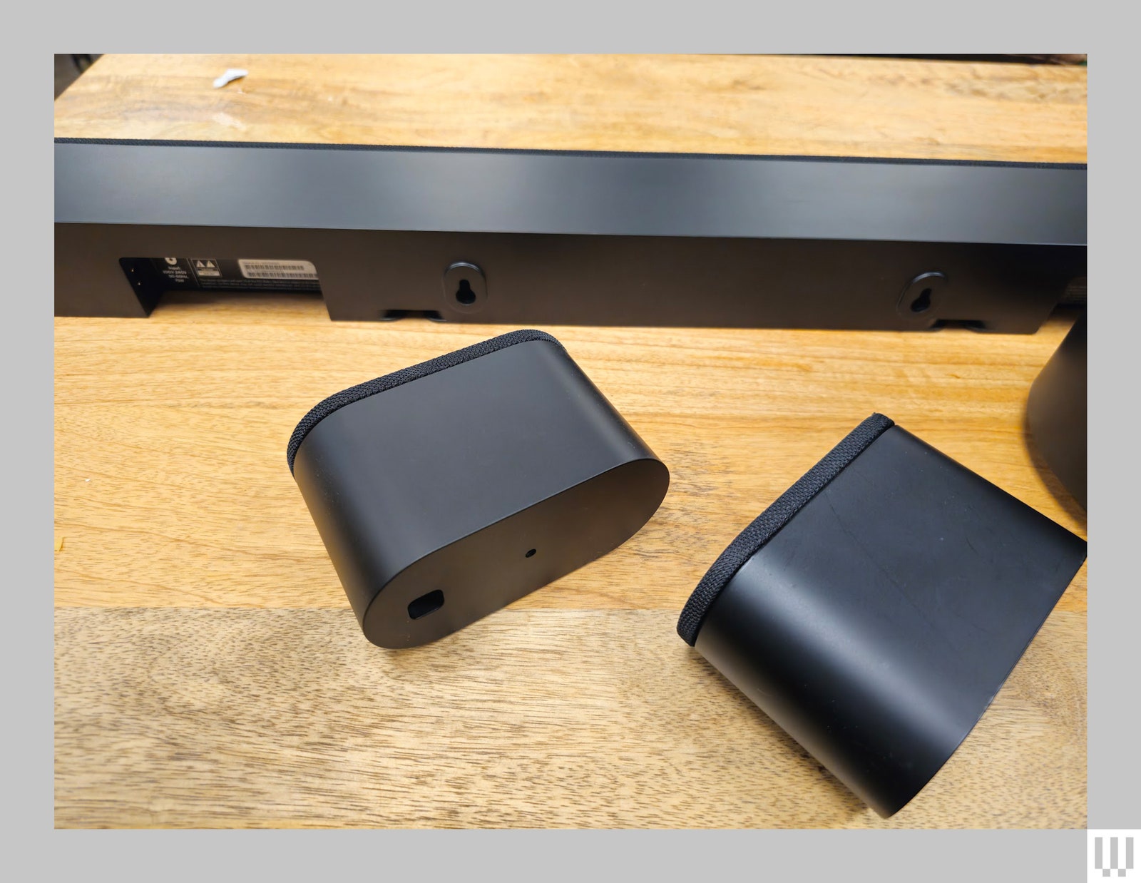 Overhead view of the two black ovalshaped speakers of the Vizio 5.1 Soundbar system