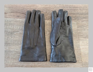 Kent Wang Deerskin Touchscreen Gloves in black laying side by side one palmdown and one palmup