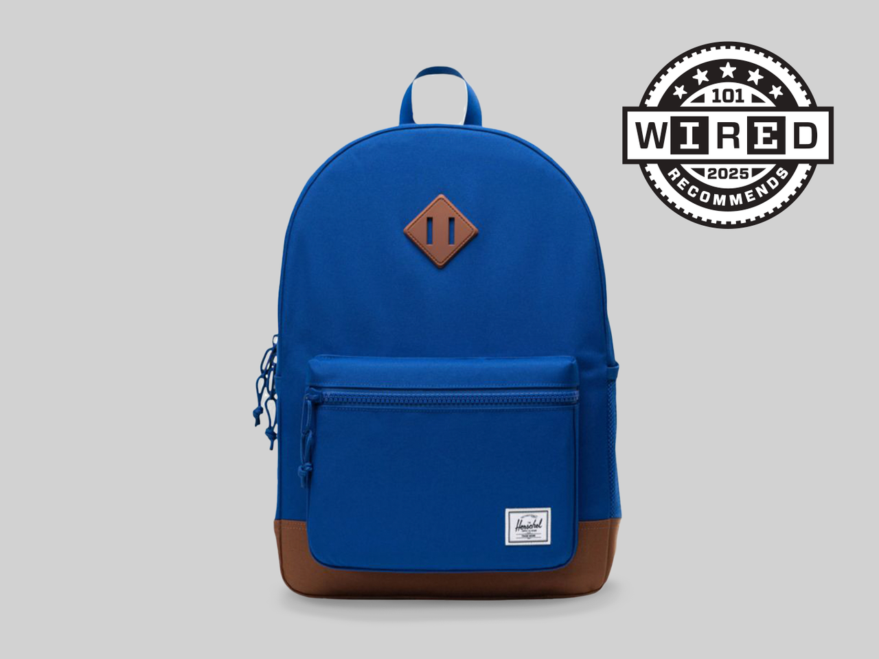 Blue Backpack with brown leather details