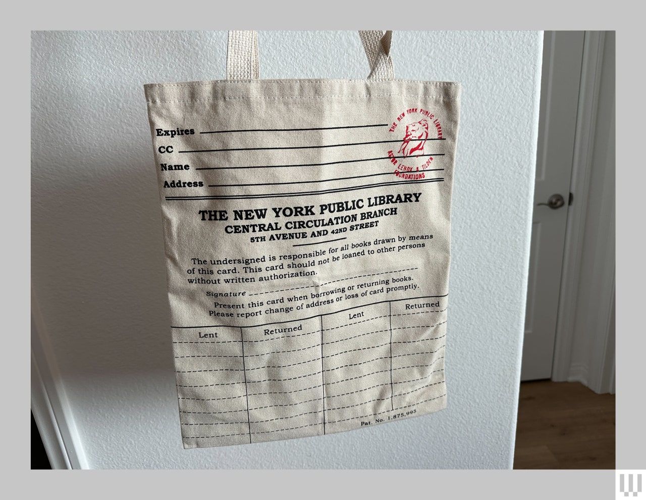 Tote bag with the exterior resembling a library card from the New York Public Library 