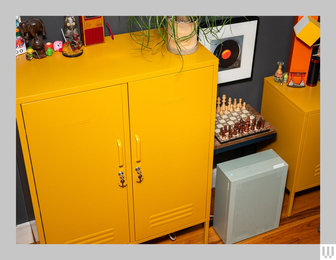 Branch Mustard Made Standard Locker in bright yellow beside a chess board in a room