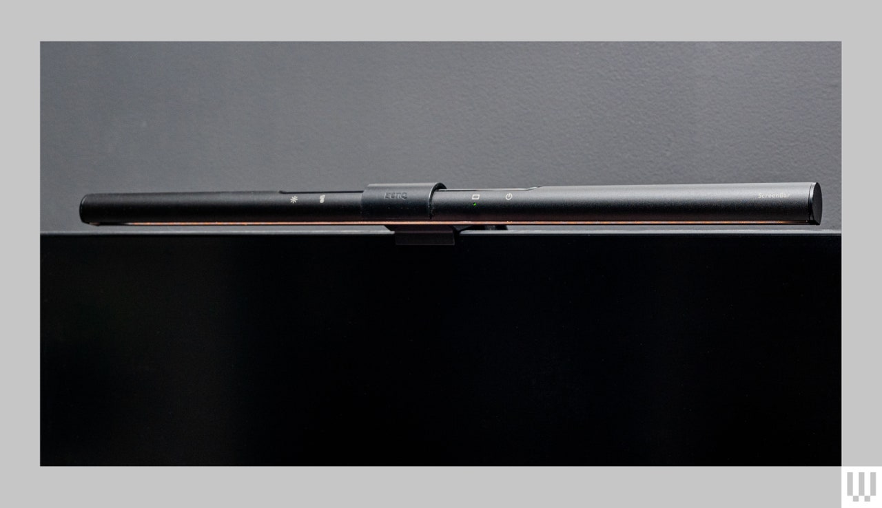 BenQ Screen Bar, a narrow cylindrical device attached to the top of a computer screen