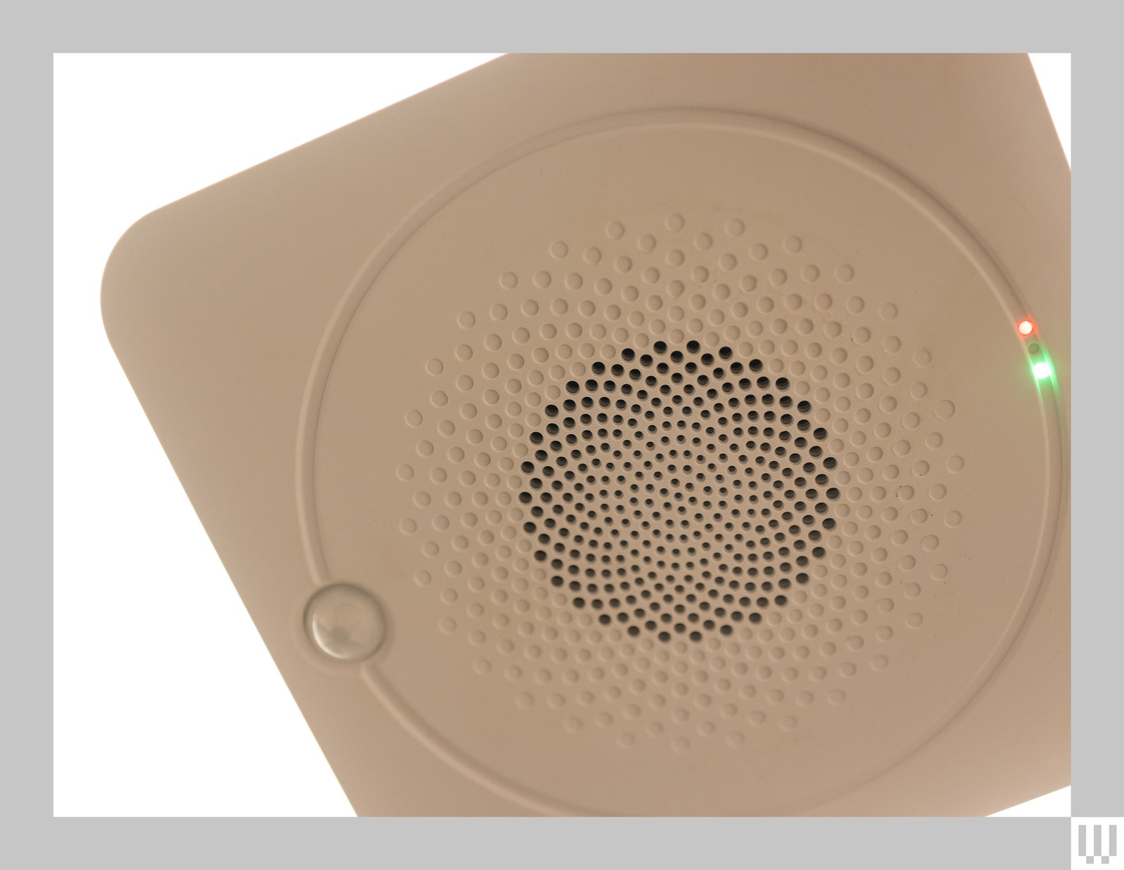 Close up of a Commercial Electric Smart Bathroom Exhaust Fan showing the holes for the vent and lights for motion sensor