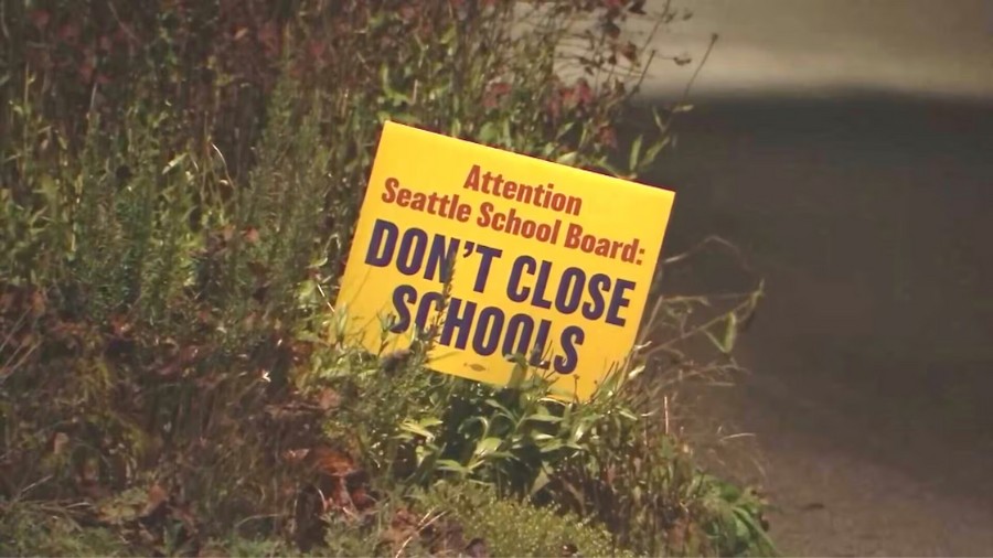 Image: A sign asking the Seattle School Board not to close any schools in the city was seen in Seat...