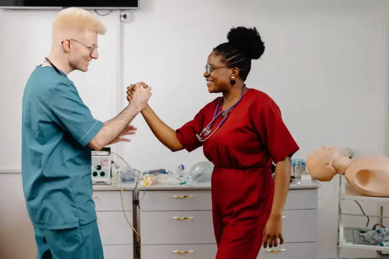 nurse greeting a doctor