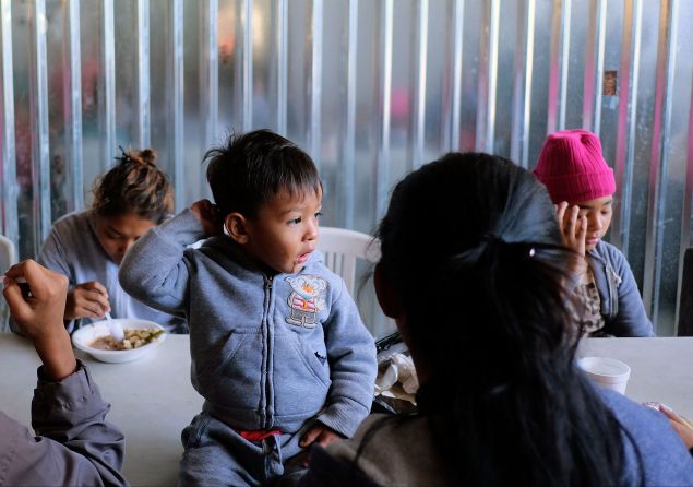 Central American migrants during the "Migrant Via Crucis" caravan, as they have breakfast at Juventud 2000 shelter in Tijuana, Mexico on April 17, 2018.