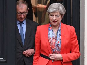 LONDON, ENGLAND - JUNE 09: British Prime Minister Theresa May leaves Conservative Party Headquaters with her husband Philip on June 9, 2017 in London, England. After a snap election was called the United Kingdom went to the polls yesterday, in a closely fought election the results from across the country are being counted and an overall result is expected in the early hours.