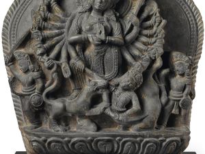 Black stone depicting Durga goddess.